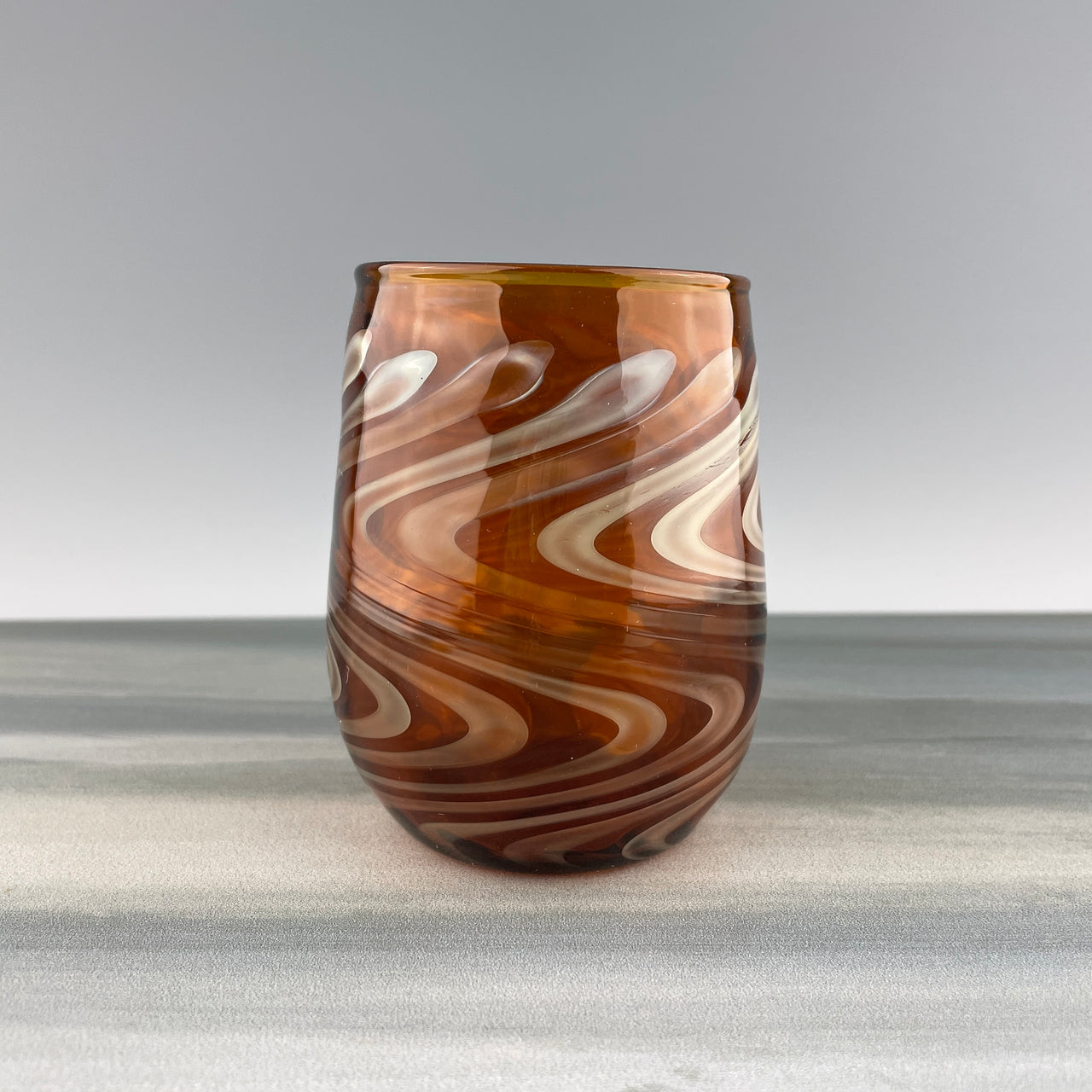 amber and silver stemless wineglass