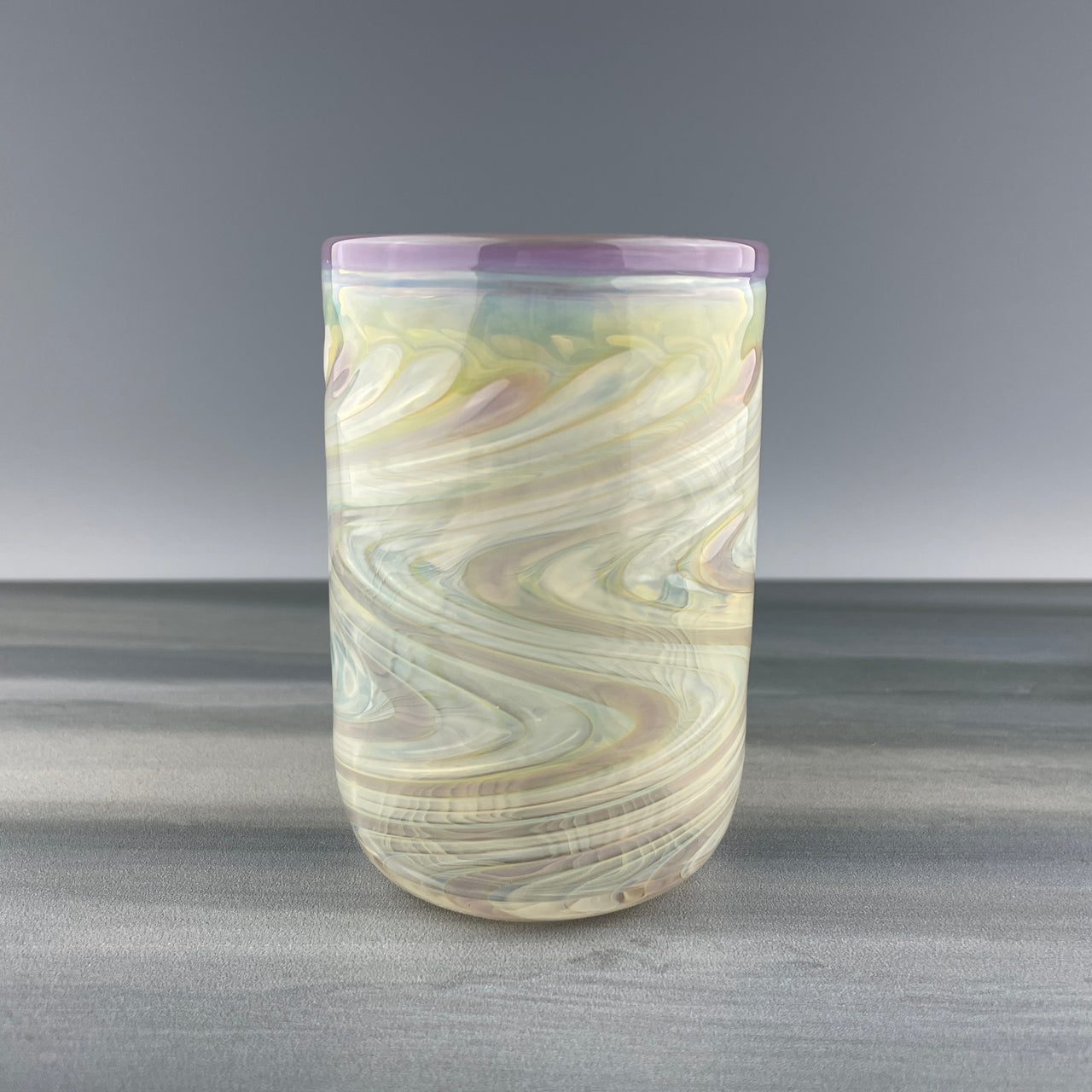 clear cup with purple sparkles