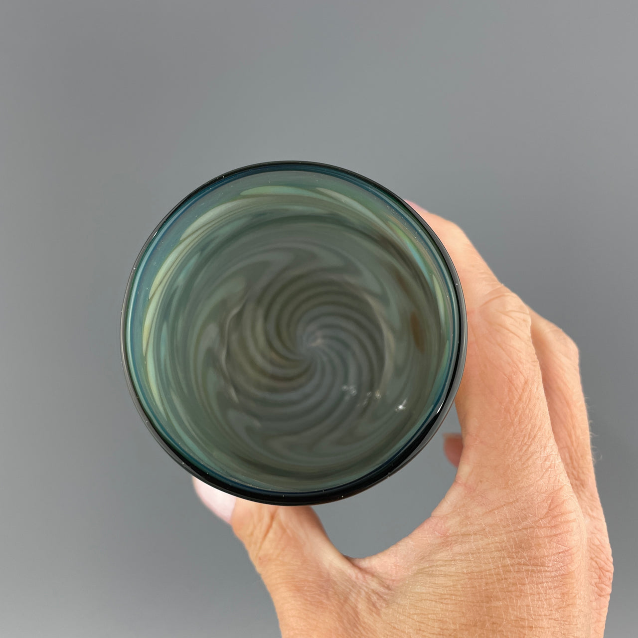 inside of a charcoal stemless wineglass