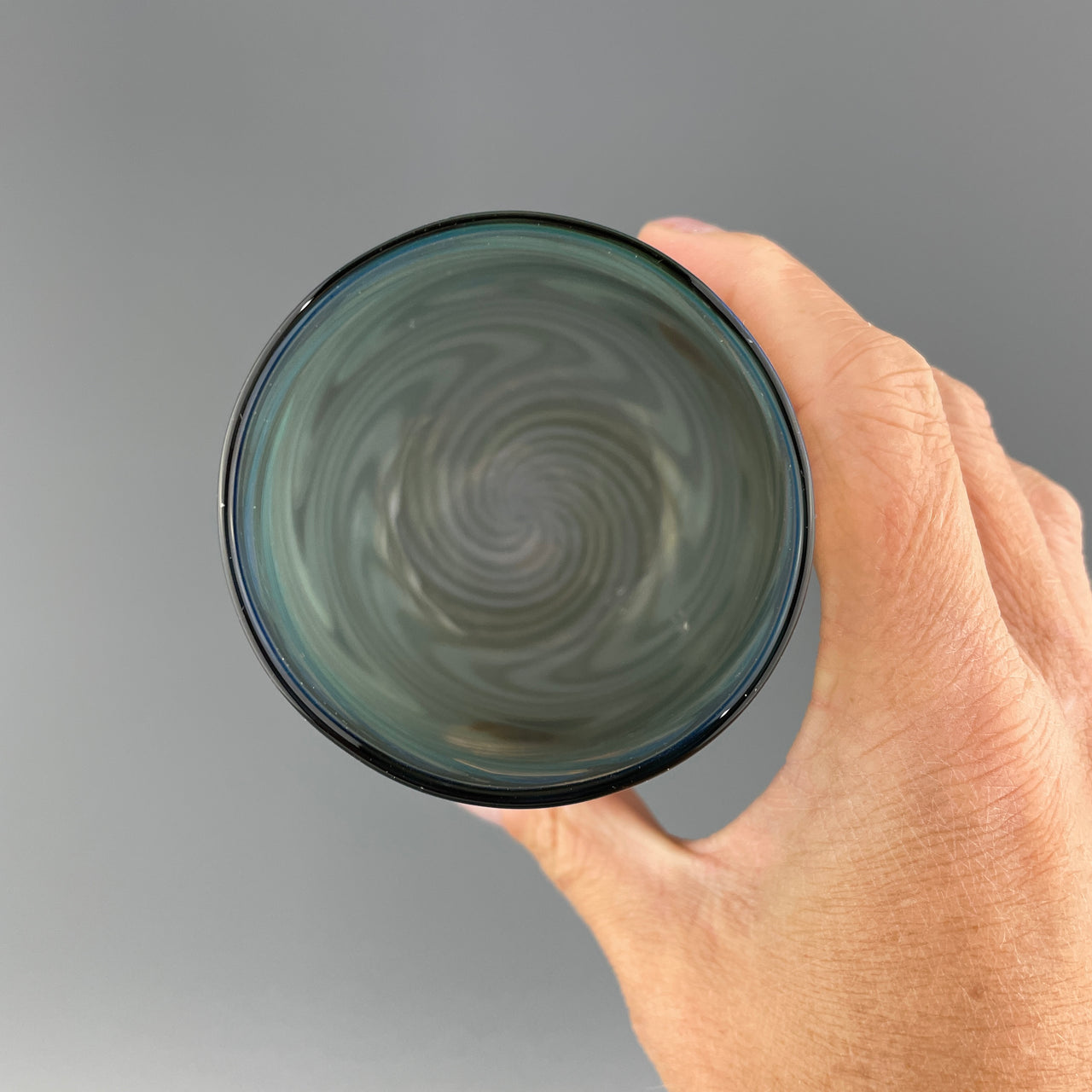 inside of a charcoal stemless wineglass