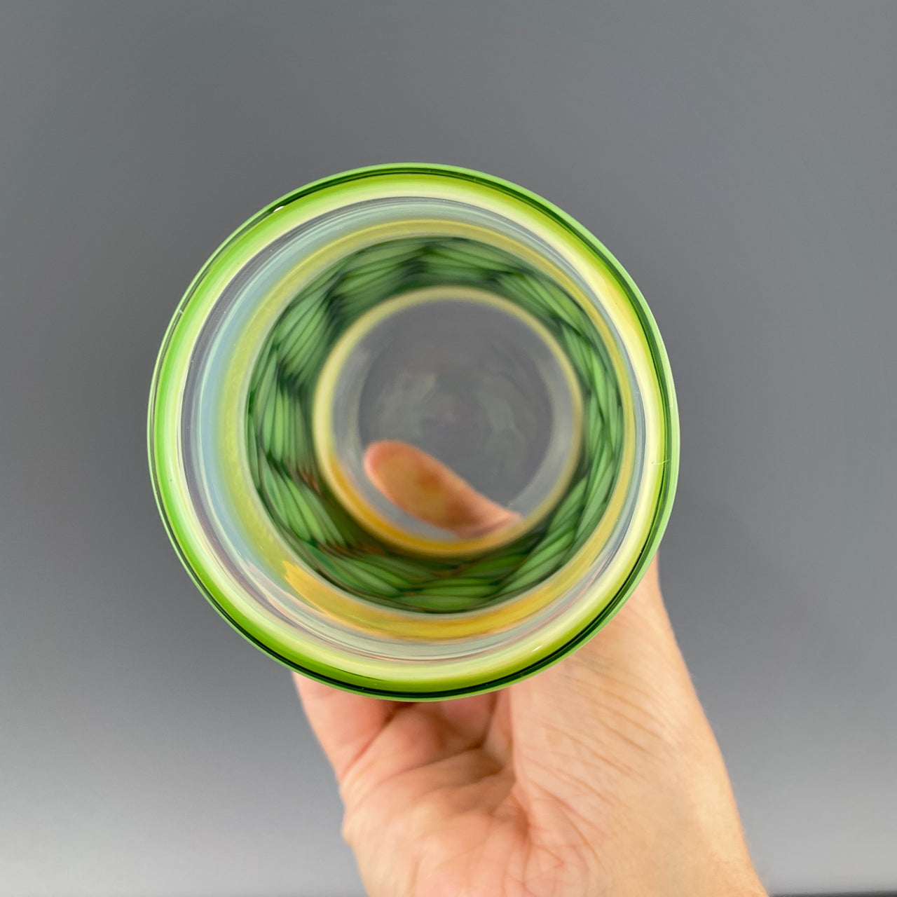inside of a clear and green dot cup