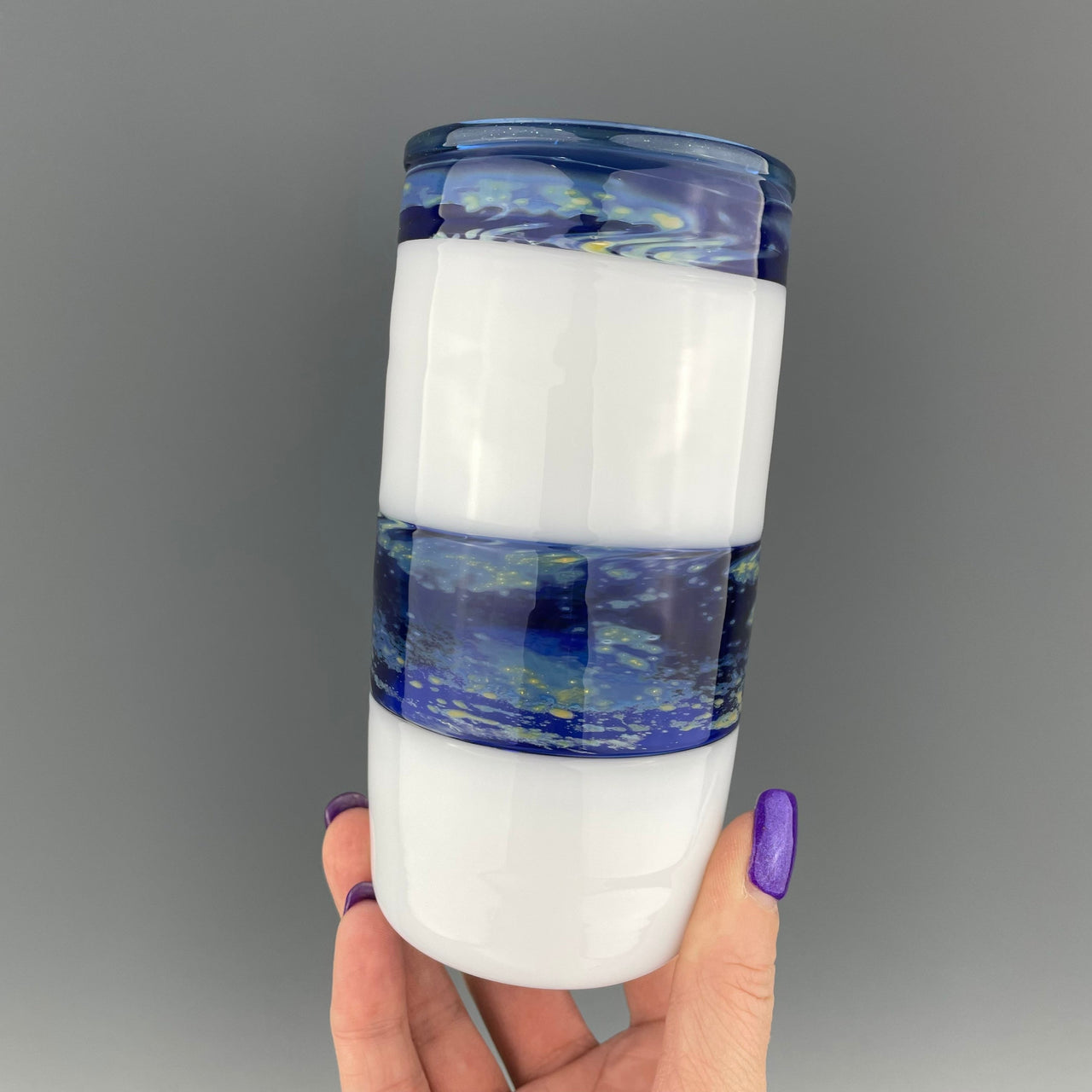 white and space blue striped cup