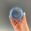 bottom of a brilliant blue swirl stemless wineglass