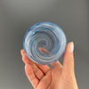 bottom of a brilliant blue swirl stemless wineglass