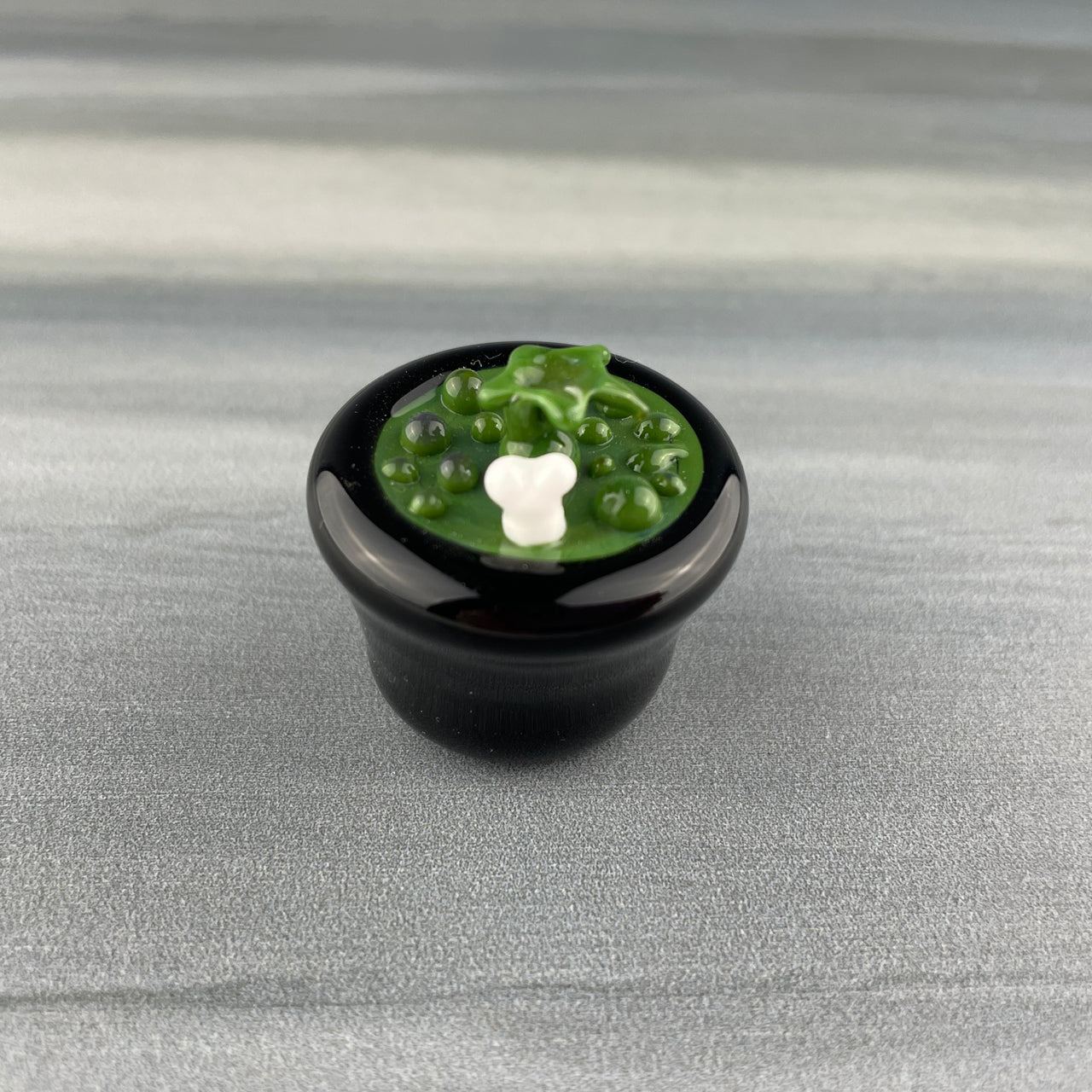 bubbling glass cauldron
