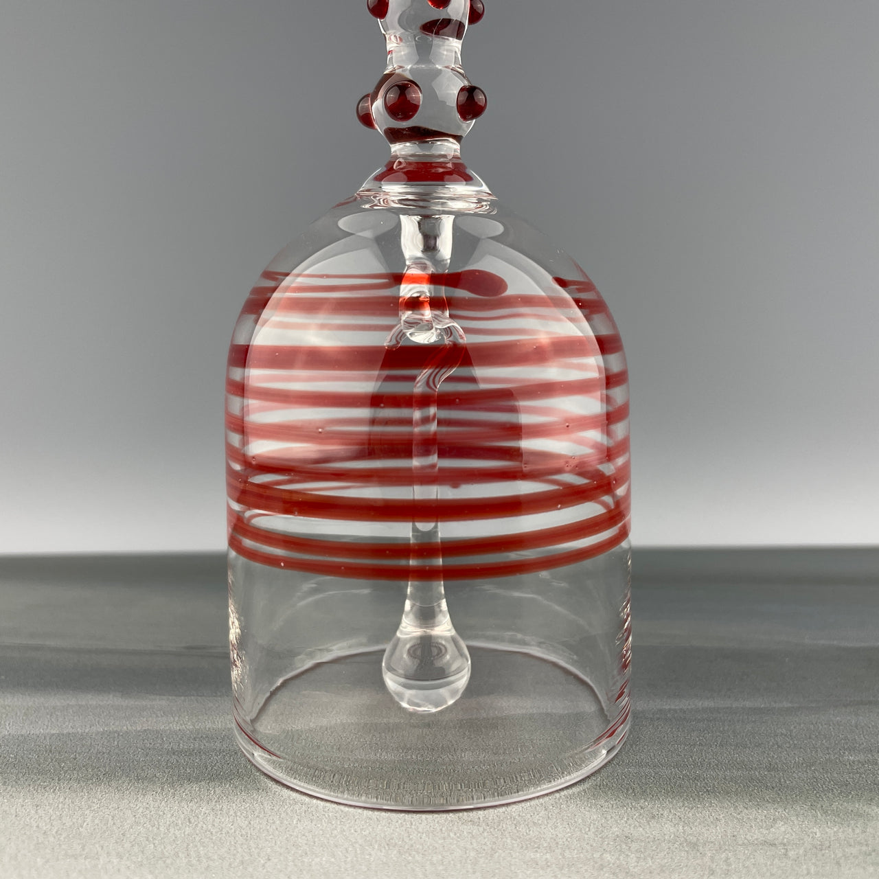 clear and red Christmas bell made of glass