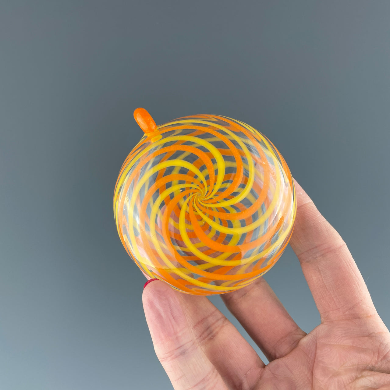 orange swirled holiday disc