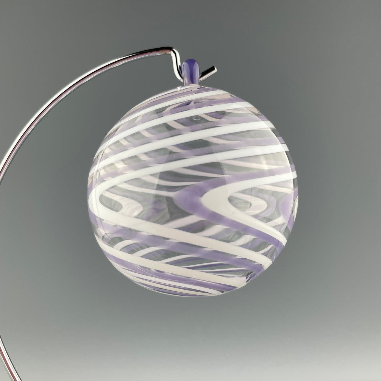 purple and white swirled christmas bulb
