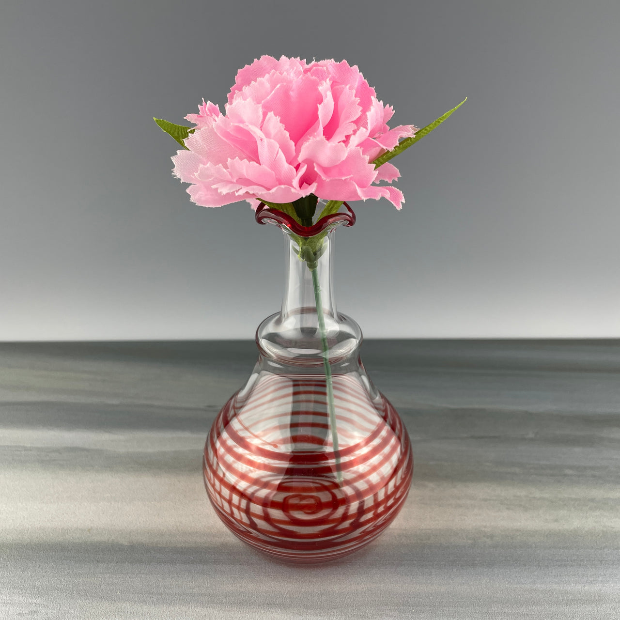 red swirl glass vase