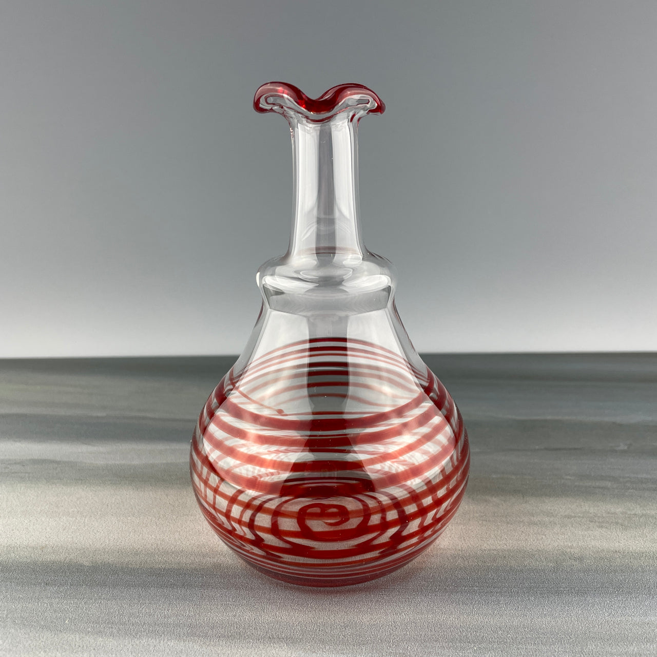 red swirl vase