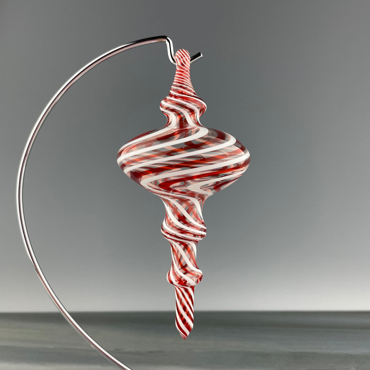 red, white, and clear christmas finial
