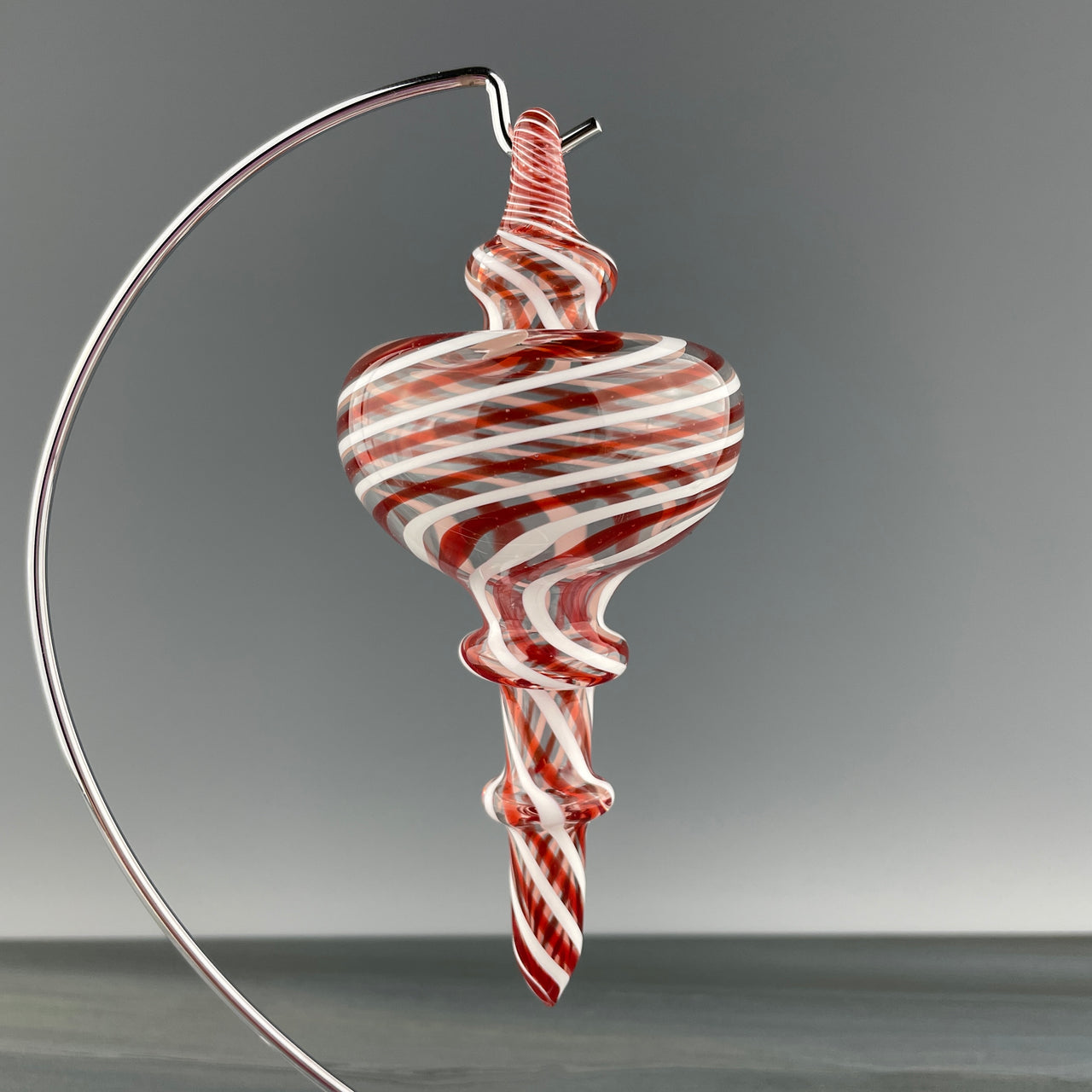 red, white, and clear christmas finial