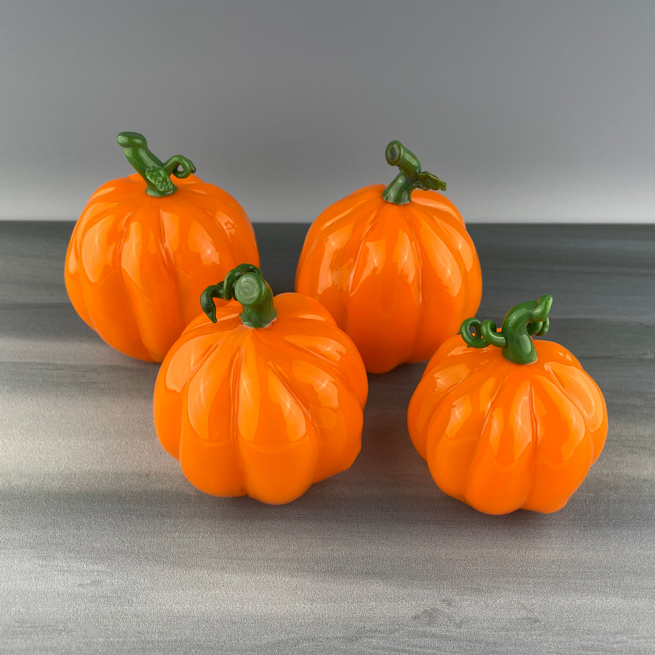 set of glass pumpkins