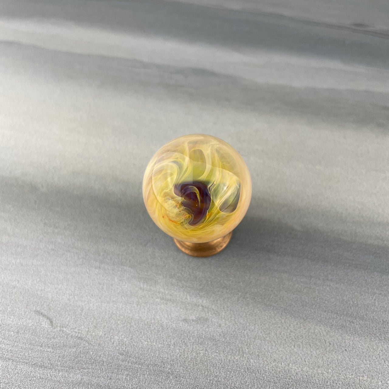 yellow hider marble