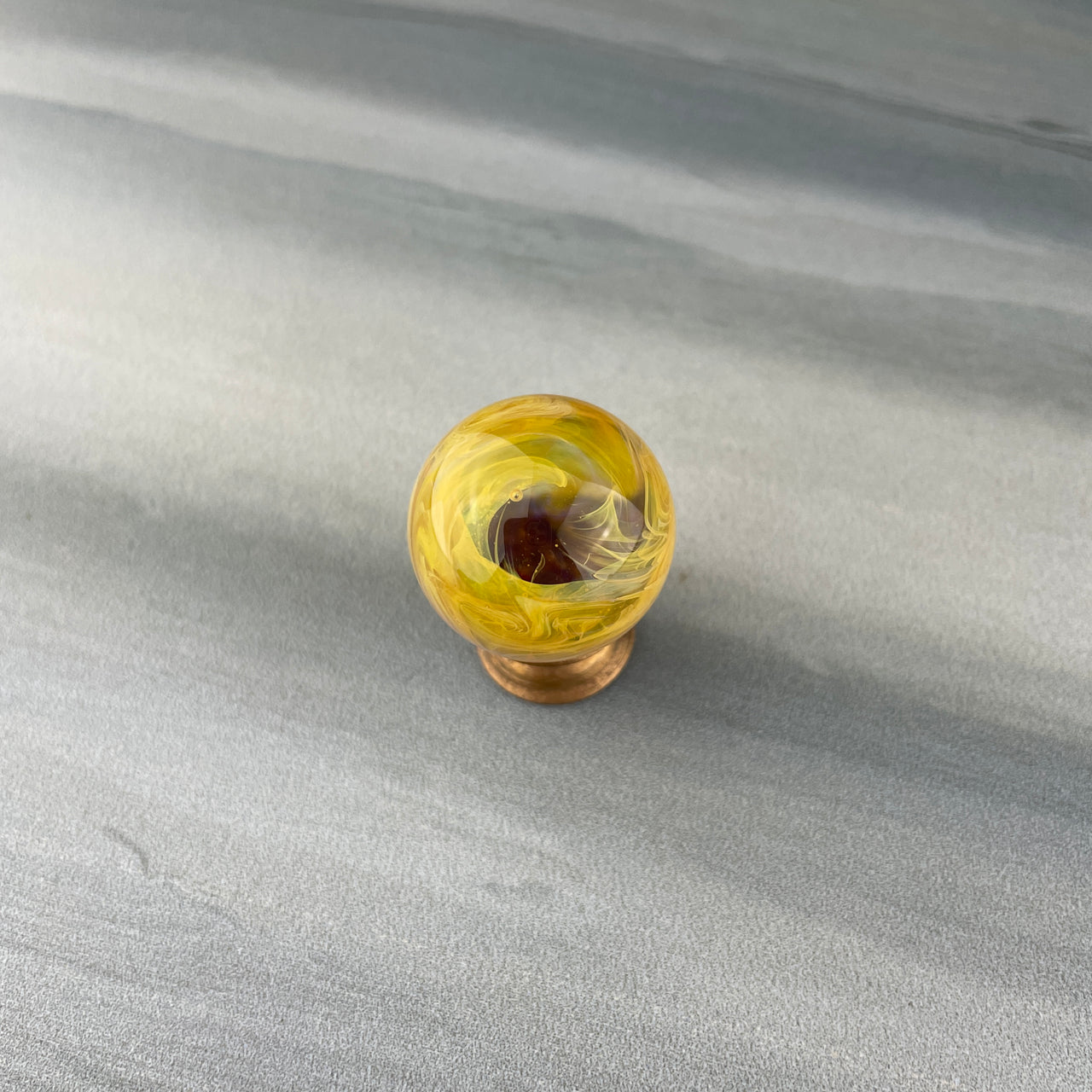 yellow hider marble
