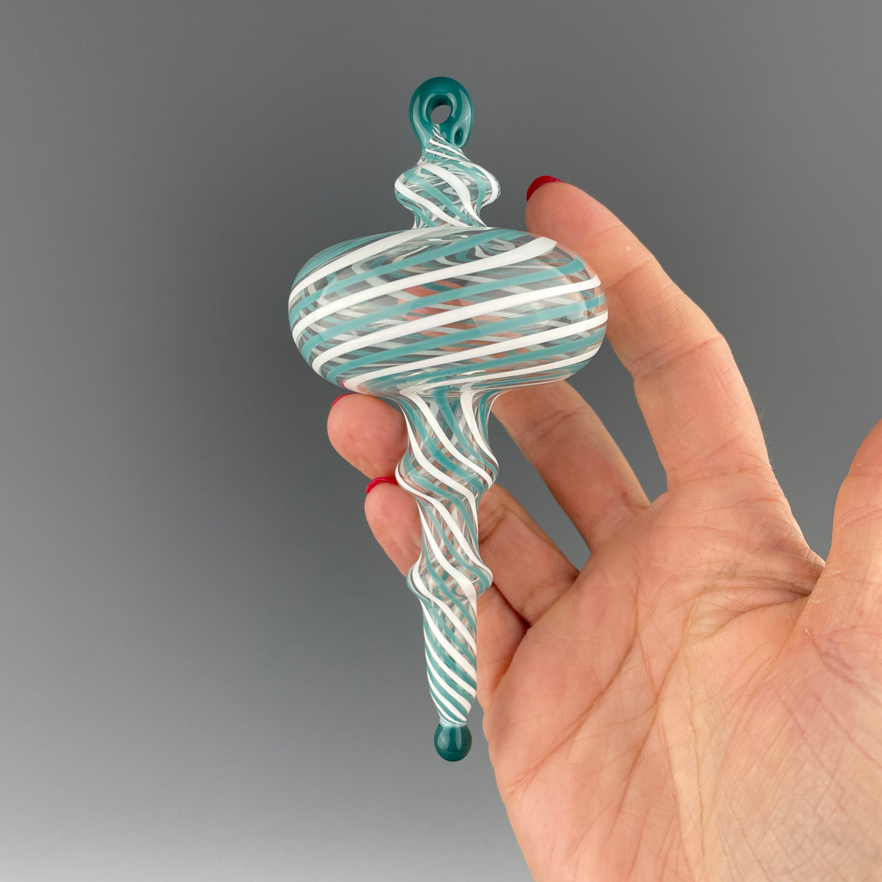 teal and white swirled christmas ornament
