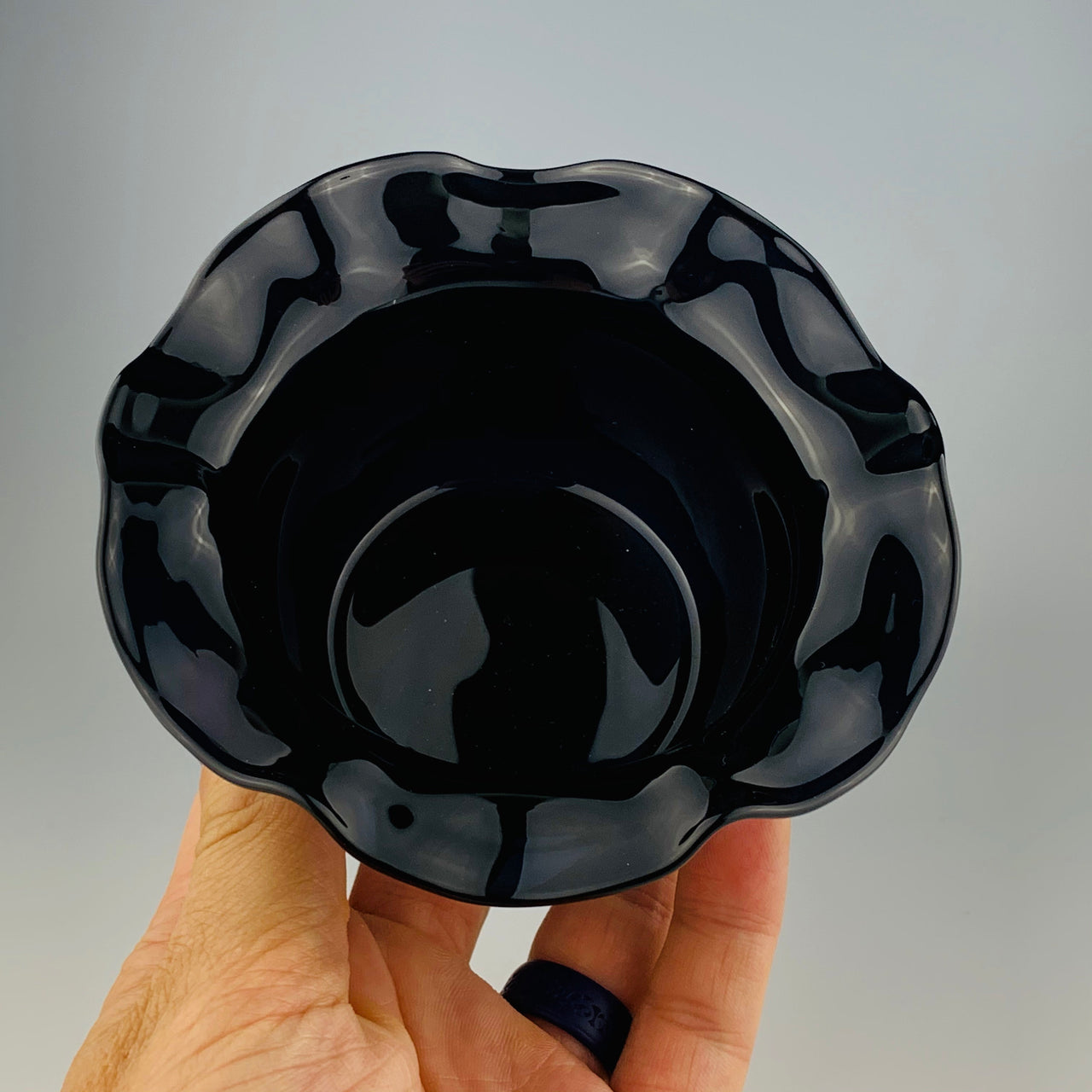 black glass wavy bowl