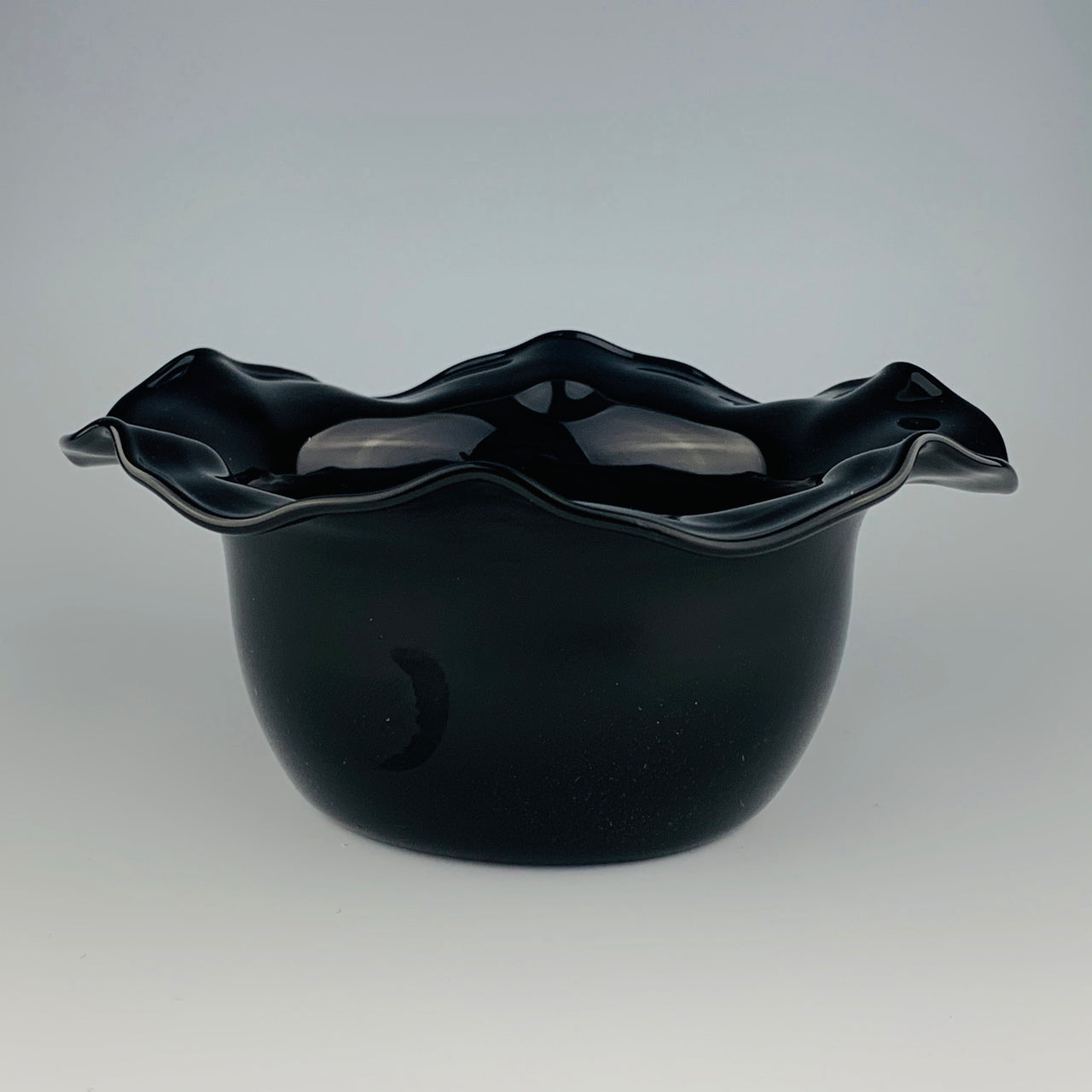 black wavy glass bowl